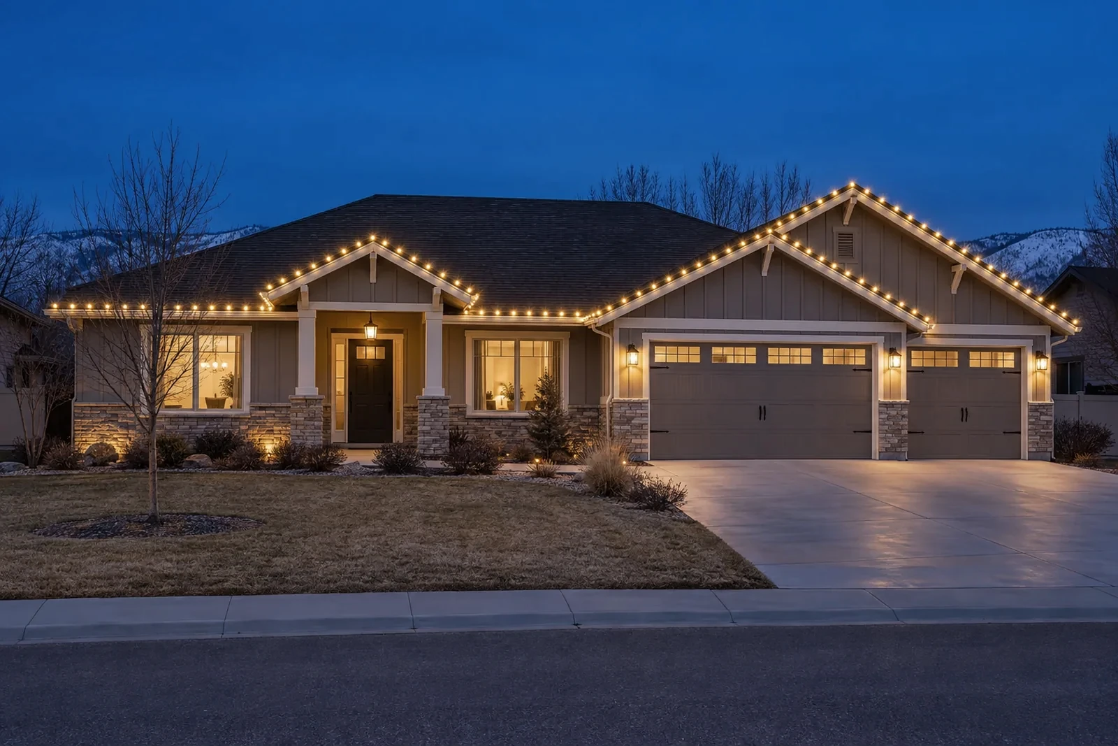 A single-story ranch with warm white C9 lights along the entire front roofline